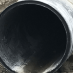 Inside view of a pipe opening that has been installed underground.