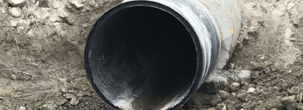 Inside view of a pipe opening that has been installed underground.