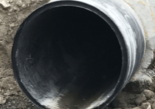 Inside view of a pipe opening that has been installed underground.